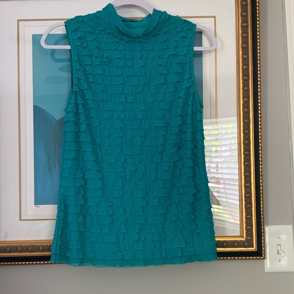 Sleeveless fringe blouse